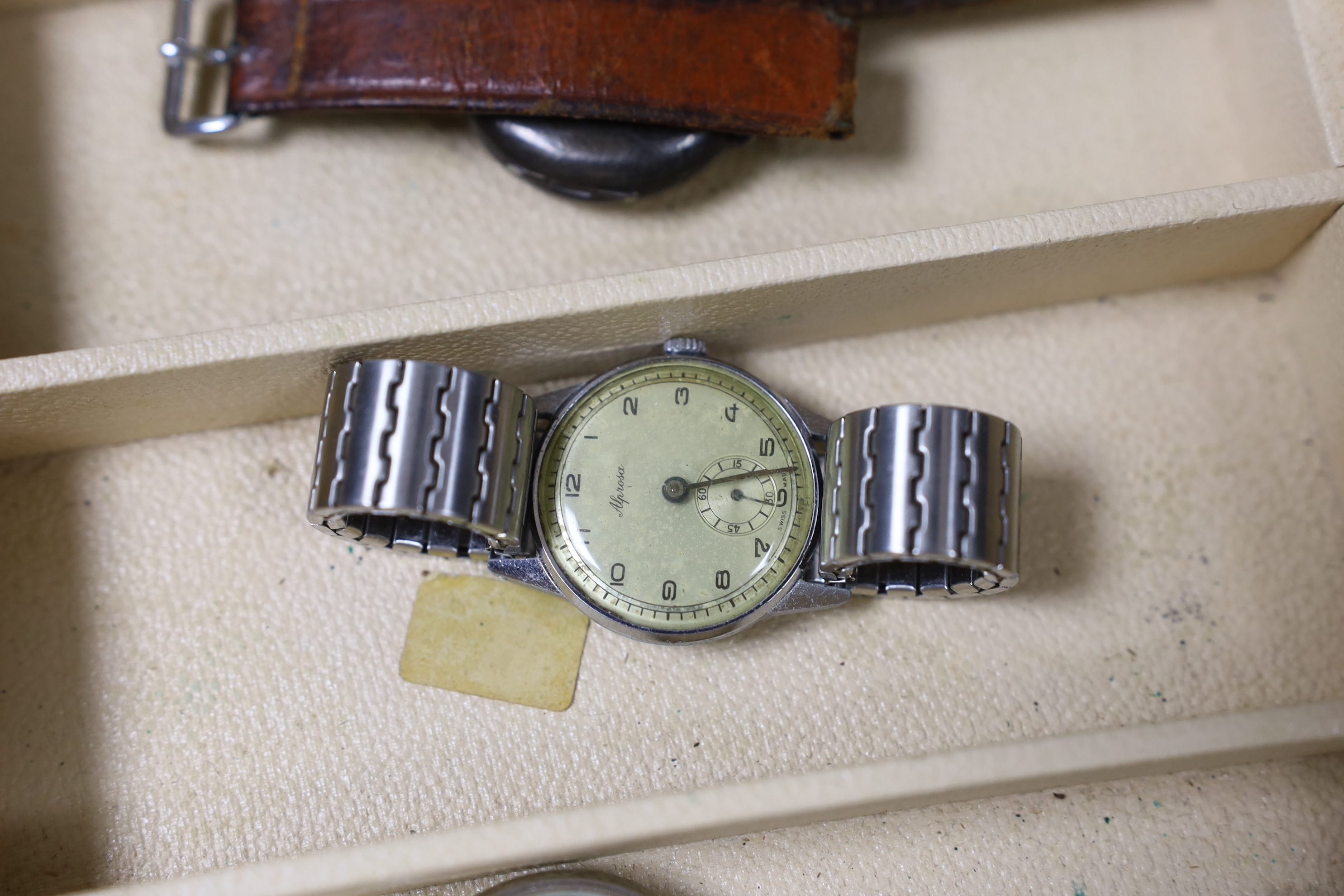 Seventeen assorted lady's or gentleman's wrist watches including a silver manual wind Omega, circa 1917 and a stainless steel Tudor, together with a pedometer?